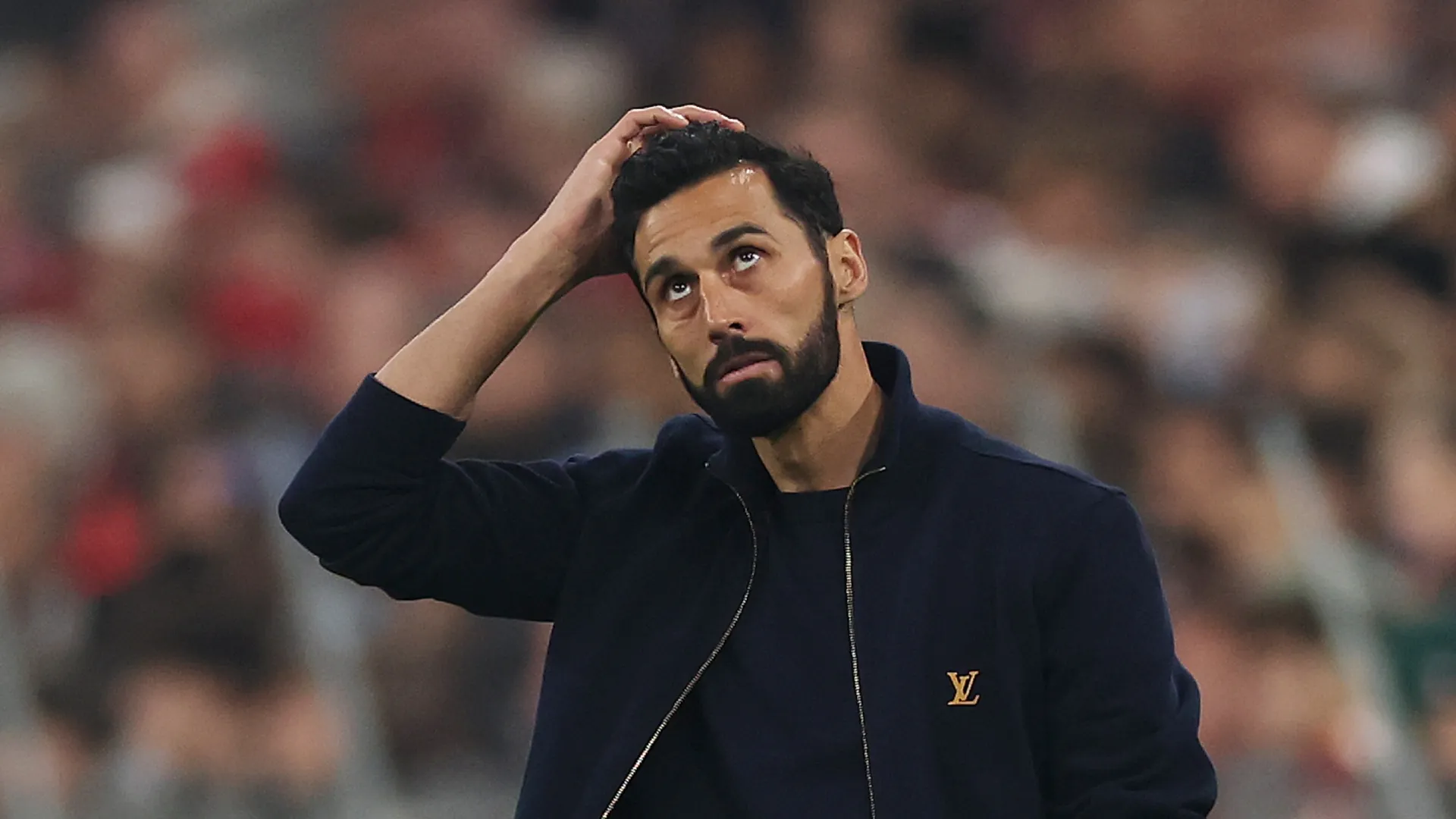 Alvaro Arbeloa grabs his head during a Real Madrid game