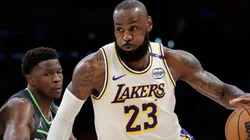 LeBron James #23 of the Los Angeles Lakers drives to the basket against Anthony Edwards #5 of the Minnesota Timberwolves during the first quarter in Game One of the Western Conference First Round NBA Playoffs at Crypto.com Arena on April 19, 2025 in Los Angeles, California.