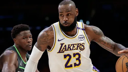 LeBron James #23 of the Los Angeles Lakers drives to the basket against Anthony Edwards #5 of the Minnesota Timberwolves during the first quarter in Game One of the Western Conference First Round NBA Playoffs at Crypto.com Arena on April 19, 2025 in Los Angeles, California.