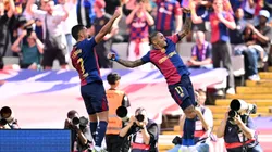 Raphinha of FC Barcelona celebrates scoring his team's third goal with teammate Ferran Torres during the LaLiga match between FC Barcelona and Real Madrid CF at Estadi Olimpic Lluis Companys on May 11, 2025 in Barcelona, Spain.