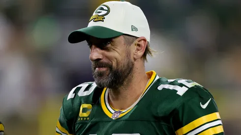Aaron Rodgers #12 of the Green Bay Packers walks off the field after a win over the Chicago Bears at Lambeau Field on September 18, 2022 in Green Bay, Wisconsin.