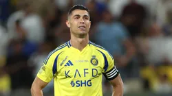 Cristiano Ronaldo of Al Nassr reacts after Karim Benzema of Al-Ittihad (not pictured) scores his team's first goal during the Saudi Pro League match between Al Nassr and Al Ittihad at Al-Awwal Park on May 07, 2025 in Riyadh, Saudi Arabia.