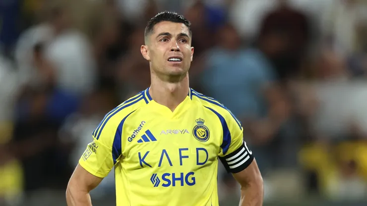 Cristiano Ronaldo of Al Nassr reacts after Karim Benzema of Al-Ittihad (not pictured) scores his team's first goal during the Saudi Pro League match between Al Nassr and Al Ittihad at Al-Awwal Park on May 07, 2025 in Riyadh, Saudi Arabia.