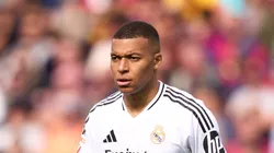 Kylian Mbappe of Real Madrid CF looks on during the LaLiga match between FC Barcelona and Real Madrid CF at Estadi Olimpic Lluis Companys