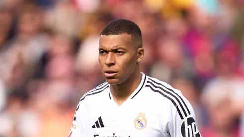 Kylian Mbappe of Real Madrid CF looks on during the LaLiga match between FC Barcelona and Real Madrid CF at Estadi Olimpic Lluis Companys