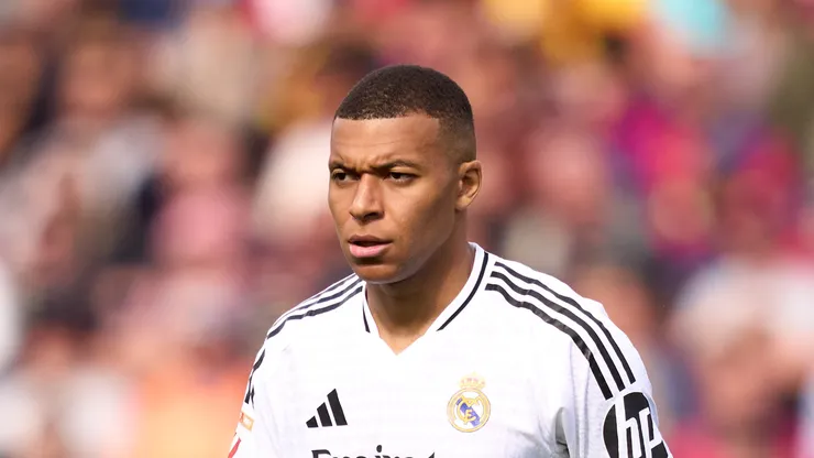 Kylian Mbappe of Real Madrid CF looks on during the LaLiga match between FC Barcelona and Real Madrid CF at Estadi Olimpic Lluis Companys