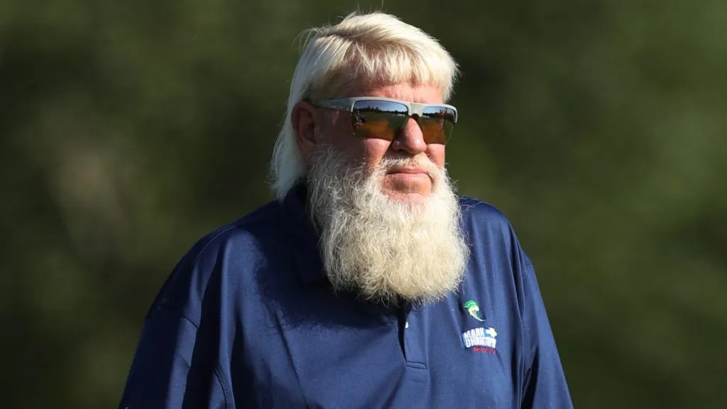 John Daly of the United States stands near his bag on the 17th hole during the continuation of round one on day two of the Insperity Invitational 2025 on May 03, 2025. (Source: Raj Mehta/Getty Images)