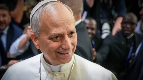 Pope Leo XIV shakes the hands and greets people of the press after an audience with thousands of journalists and media workers on May 12, 2025 at Paul VI Hall in Vatican City, Vatican.