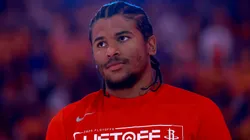 Jalen Green #4 of the Houston Rockets stands on the court for the national anthem before their game against the Golden State Warriors in Game Three of the Western Conference First Round NBA Playoffs at Chase Center on April 26, 2025 in San Francisco, California.