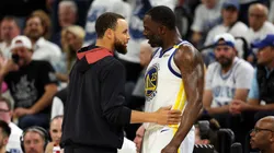 Stephen Curry #30 (L) talks to Draymond Green #23 of the Golden State Warriors after Green was assessed a technical foul against the Minnesota Timberwolves.