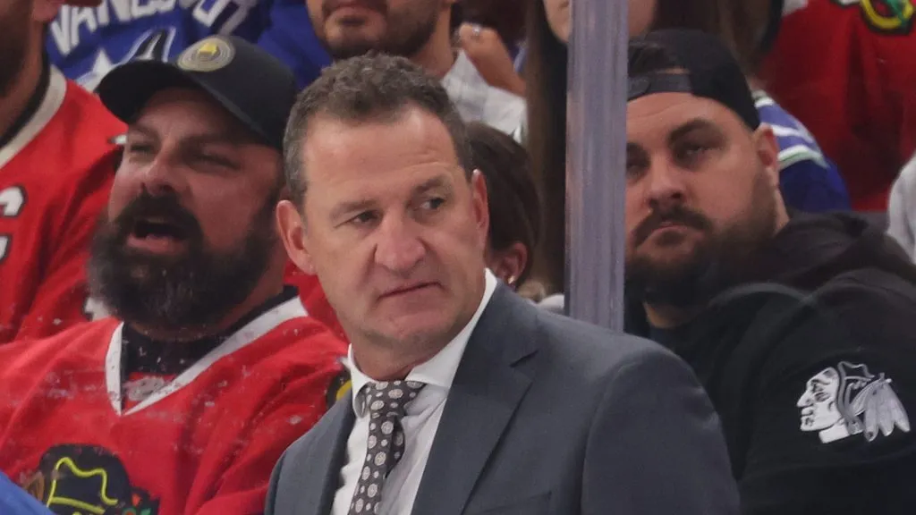 Assistant coach Adam Foote of the Vancouver Canucks looks on against the Chicago Blackhawks during the first period at the United Center on October 22, 2024 in Chicago, Illinois.