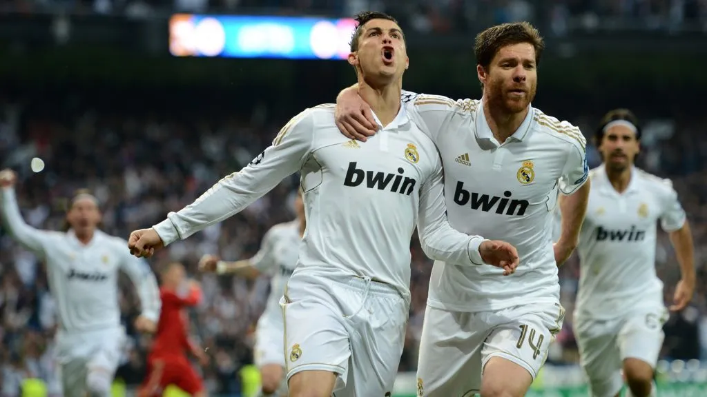 Xabi Alonso and Cristiano Ronaldo playing for Real Madrid