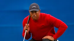 Tiger Woods of the United States lines up a putt on the 18th green during a sudden-death playoff during the second round of the PNC Championship at Ritz-Carlton Golf Club on December 22, 2024 in Orlando, Florida.