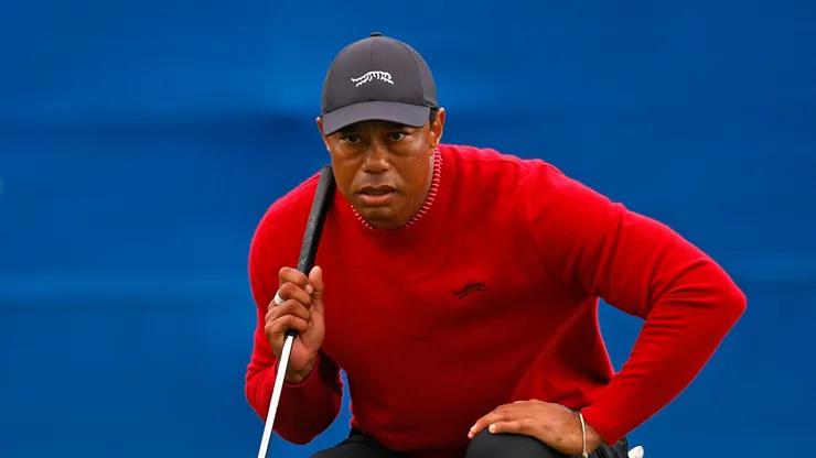 Tiger Woods of the United States lines up a putt on the 18th green during a sudden-death playoff during the second round of the PNC Championship at Ritz-Carlton Golf Club on December 22, 2024 in Orlando, Florida.