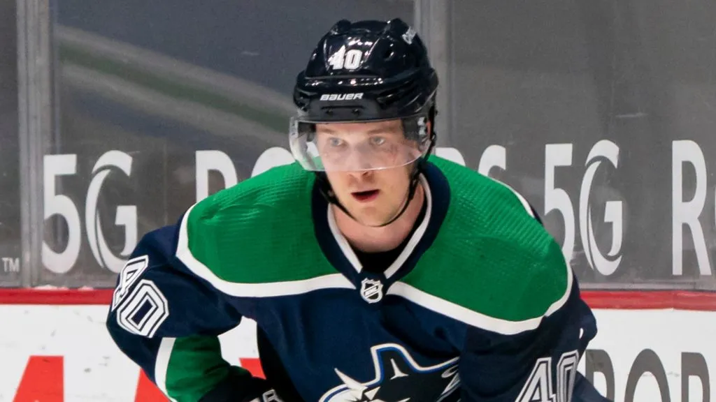 Elias Pettersson #40 of the Vancouver Canucks skates with the puck during NHL hockey action against the Winnipeg Jets at Rogers Arena on February 19, 2021 in Vancouver, Canada.