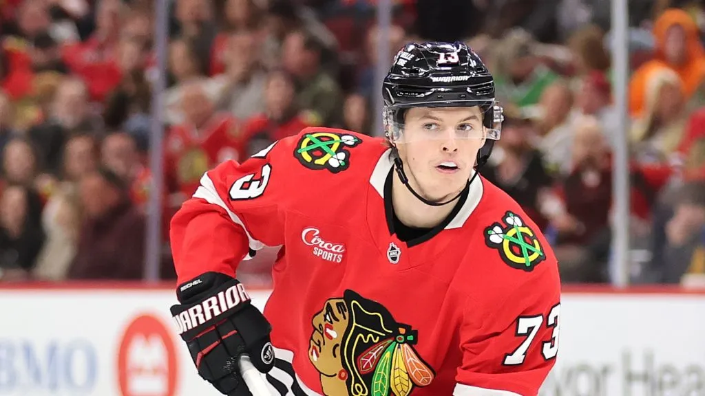 Lukas Reichel #73 of the Chicago Blackhawks skates with the puck against the Winnipeg Jets during the second period at the United Center on December 07, 2024 in Chicago, Illinois.