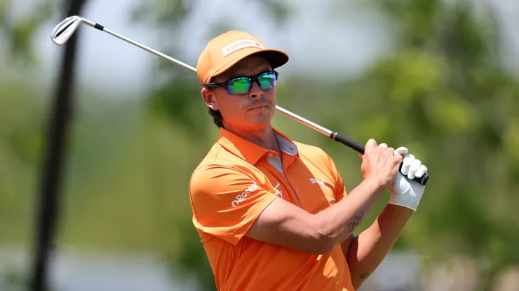 Rickie Fowler of the United States plays his shot from the first tee during the final round of the Truist Championship 2025 at The Wissahickon on May 11, 2025.