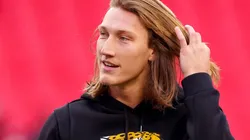 Trevor Lawrence #16 of the Jacksonville Jaguars warms up prior to the AFC Divisional Playoff game against the Kansas City Chiefs at Arrowhead Stadium on January 21, 2023 in Kansas City, Missouri.