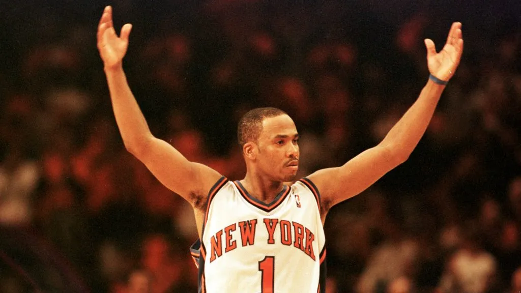 Chris Childs tries to get the crowd into the game during first round of the NBA Playoffs in 2000. (Getty Images)