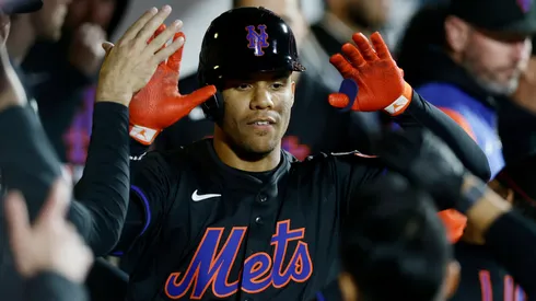 Juan Soto #22 of the New York Mets celebrates his fourth inning home run against the Chicago Cubs with his teammates in the dugout at Citi Field on May 09, 2025 in New York City.