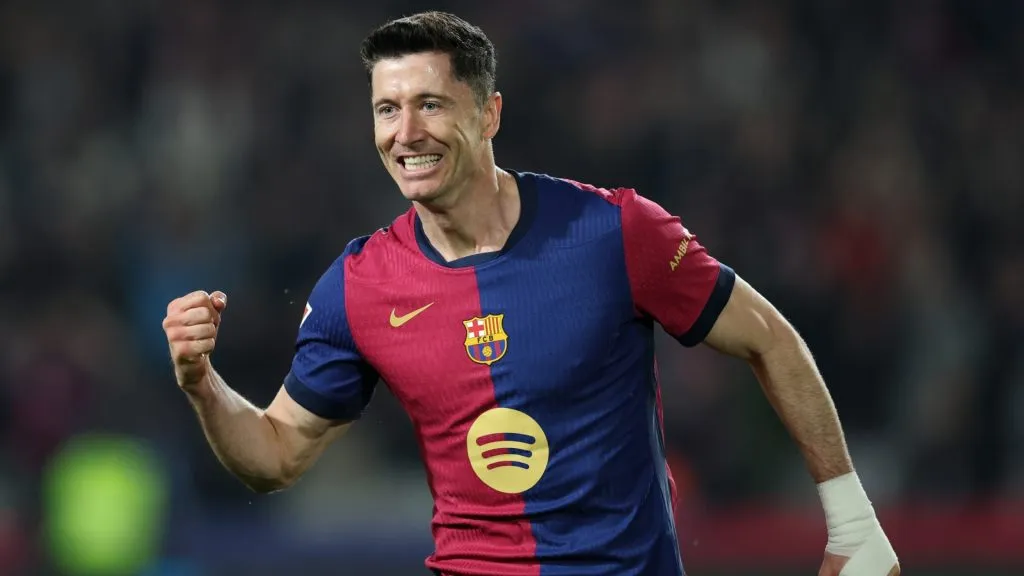 Robert Lewandowski of FC Barcelona celebrates scoring his team’s third goal during the La Liga EA Sports match between FC Barcelona and CA Osasuna on March 27, 2025. (Source: Clive Brunskill/Getty Images)