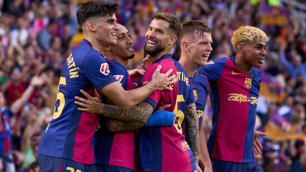 Raphinha (2nd L) of FC Barcelona celebrates with his teammates Gerard Martin, Inigo Martinez, Dani Olmo and Lamine Yamal after scoring their team’s fourth goal during the LaLiga match between FC Barcelona and Real Madrid CF at Estadi Olimpic Lluis Companys on May 11, 2025 in Barcelona, Spain. (Photo by Alex Caparros/Getty Images)