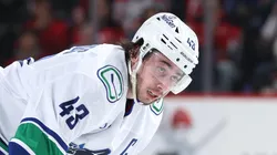 Quinn Hughes #43 of the Vancouver Canucks looks on before a face off against the New Jersey Devils in the third period at Prudential Center on March 24, 2025 in Newark, New Jersey. The Vancouver Canucks defeated the New Jersey Devils 4-3 after an overtime period and a shootout.