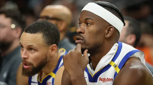 Jimmy Butler III #10 and Stephen Curry #30 of the Golden State Warriors.