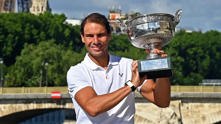 Rafael Nadal of Spain poses with the Musketeers trophy after winning his 14th Roland Garros Grand Chelem tournament on Alexander the 3rd bridge on June 06, 2022.