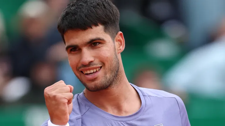 Carlos Alcaraz of Spain celebrates winning match point against Francisco Cerundolo.
