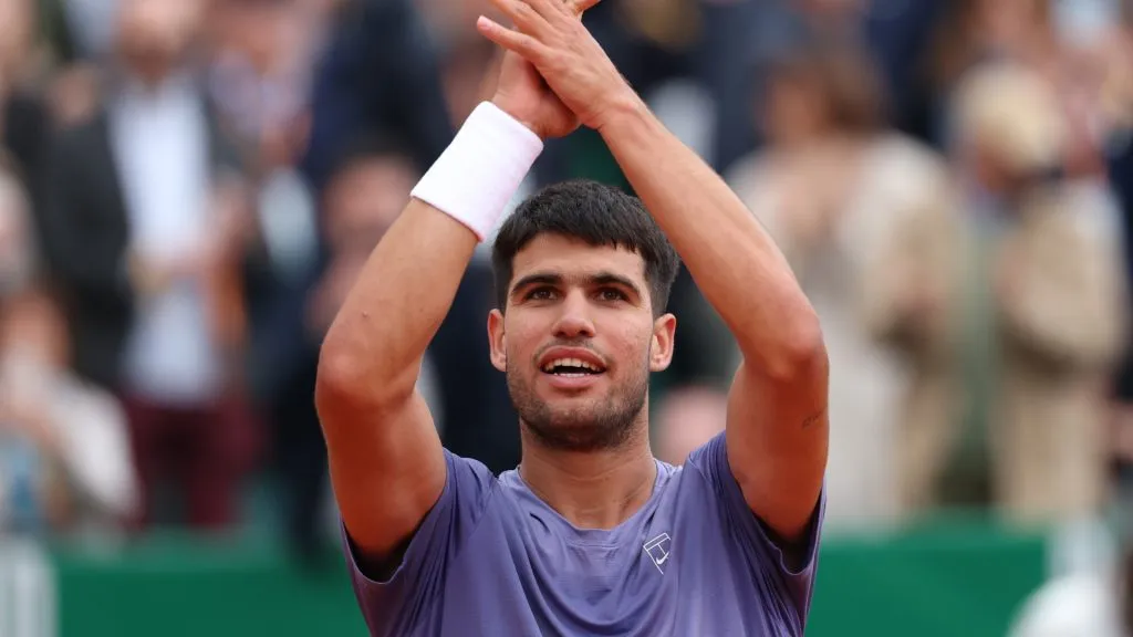 Carlos Alcaraz of Spain celebrates winning match point against Francisco Cerundolo of Argentina during the Men’s Singles Second Round match on day four in 2025. (Source: Clive Brunskill/Getty Images)