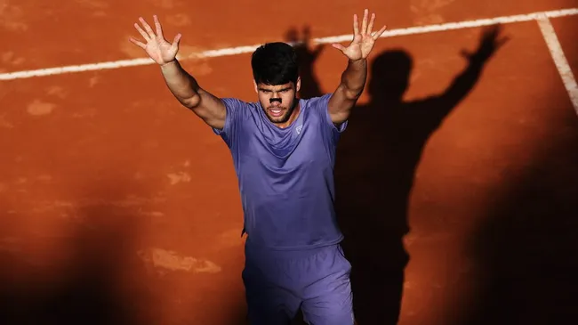 Carlos Alcaraz celebrates after defeating Lorenzo Musetti in the Rome Open semifinals. (Dan Istitene/Getty Images)