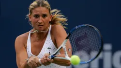 Tatiana Golovin of France returns a shot against Jelena Jankovic of Serbia during the Rogers Cup.