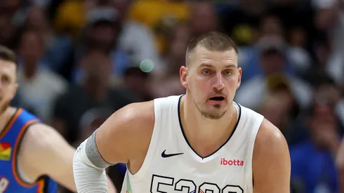 Nikola Jokic #15 of the Denver Nuggets dribbles the ball ahead of Isaiah Hartenstein #55 of the Oklahoma City Thunder during the first quarter in Game Six of the Western Conference Second Round NBA Playoffs