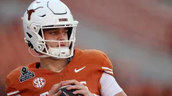Arch Manning #16 of the Texas Longhorns warms up before the Playoff First Round Game against the Clemson Tigers at Darrell K Royal-Texas Memorial Stadium on December 21, 2024 in Austin, Texas.