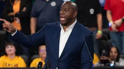 Former NBA star Earvin "Magic" Johnson speaks at a rally with Democratic presidential nominee Vice President Kamala Harris at the Dort Financial Center on October 04, 2024 in Flint, Michigan.