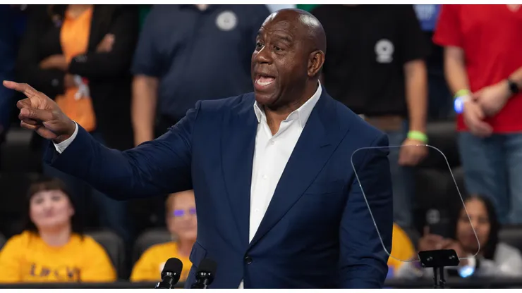 Former NBA star Earvin "Magic" Johnson speaks at a rally with Democratic presidential nominee Vice President Kamala Harris at the Dort Financial Center on October 04, 2024 in Flint, Michigan.