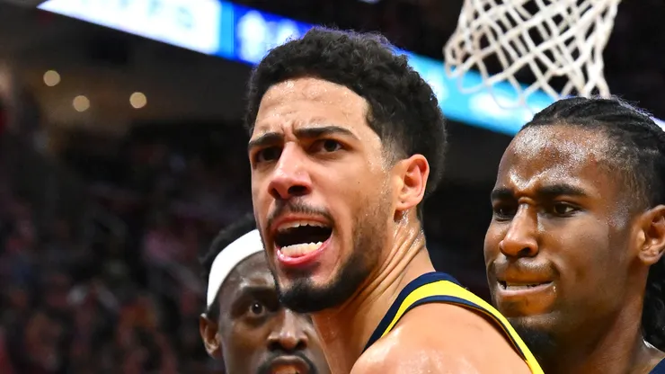 Tyrese Haliburton #0 of the Indiana Pacers celebrates with Pascal Siakam #43 and Aaron Nesmith #23 after making a basket against the Cleveland Cavaliers during the fourth quarter in Game Five of the Eastern Conference Second Round NBA Playoffs