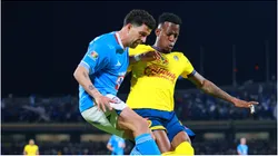 Ignacio Rivero of Cruz Azul battles for possession with Cristian Borja of America