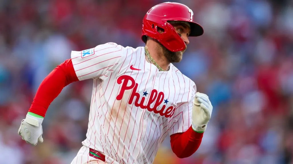 Bryce Harper #3 of the Philadelphia Phillies heads to second base after hitting an RBI double against the Pittsburgh Pirates