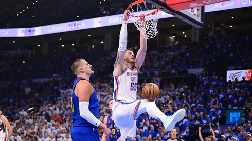 Isaiah Hartenstein #55 of the Oklahoma City Thunder finishes a slam dunk during the first half of game five of the Western Conference semifinals against the Denver Nuggets at Paycom Center on May 13, 2025 in Oklahoma City, Oklahoma.