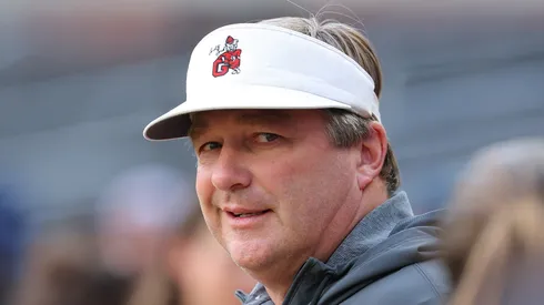 Head coach Kirby Smart of the Georgia Bulldogs walks the field during batting practice prior to the game between the Atlanta Braves and the Los Angeles Dodgers at Truist Park on May 02, 2025 in Atlanta, Georgia.