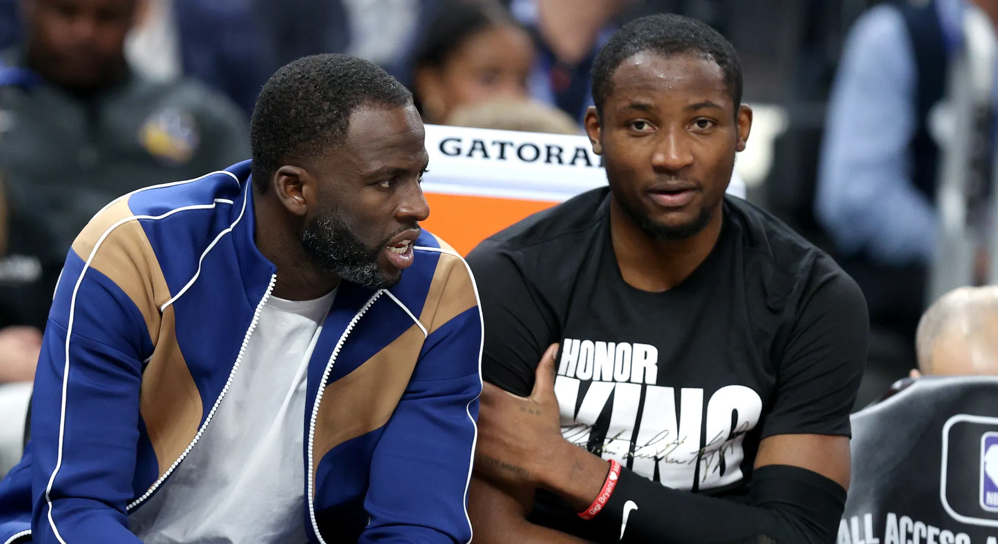 Draymond Green and Jonathan Kuminga speaking