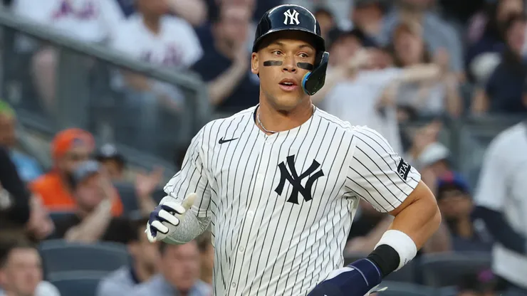 Aaron Judge #99 of the New York Yankees scores in the first inning against the New York Mets during their game at Yankee Stadium on May 18, 2025 in New York City.