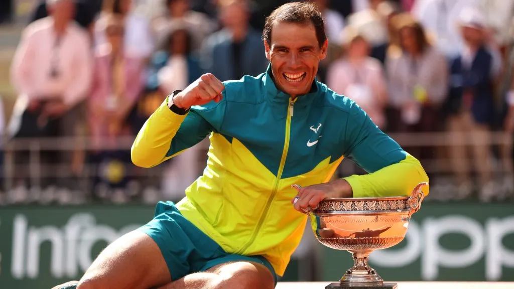 Rafael Nadal of Spain celebrates with the trophy after winning against Casper Ruud of Norway during the Men’s Singles Final match on Day 15 of The 2022 French Open. (Source: Clive Brunskill/Getty Images)