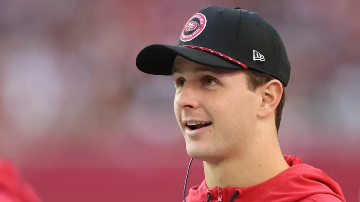 Brock Purdy #13 of the San Francisco 49ers looks on from the sidelines during the second quarter against the Arizona Cardinals at State Farm Stadium on January 05, 2025 in Glendale, Arizona.