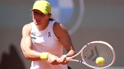 Iga Swiatek of Poland plays a backhand in her women's round of 64 match against Elisabetta Cocciaretto of Italy on Day Four of the Internazionali BNL D'Italia 2025 at Foro Italico on May 08, 2025 in Rome, Italy.