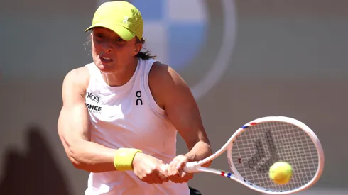 Iga Swiatek of Poland plays a backhand in her women's round of 64 match against Elisabetta Cocciaretto of Italy on Day Four of the Internazionali BNL D'Italia 2025 at Foro Italico on May 08, 2025 in Rome, Italy.
