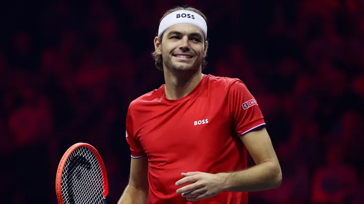 Taylor Fritz of Team World smiles against Alexander Zverev of Team Europeduring the Men's Singles match on day two of the Laver Cup at Uber Arena on September 21, 2024.