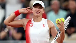Iga Swiatek of Team Poland celebrates victory against Irina-Camelia Bego of Team Romania during the Women's Singles First Round on day one of the Olympic Games Paris 2024.